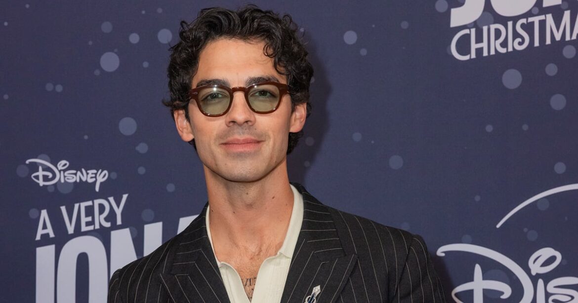 Joe Jonas Reacts to Critic Asking If Jonas Brothers Are in “Serious Debt”